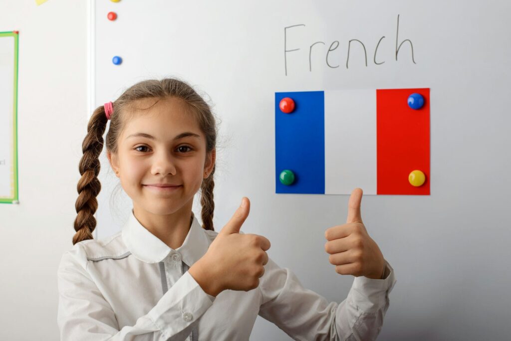 girl learning french