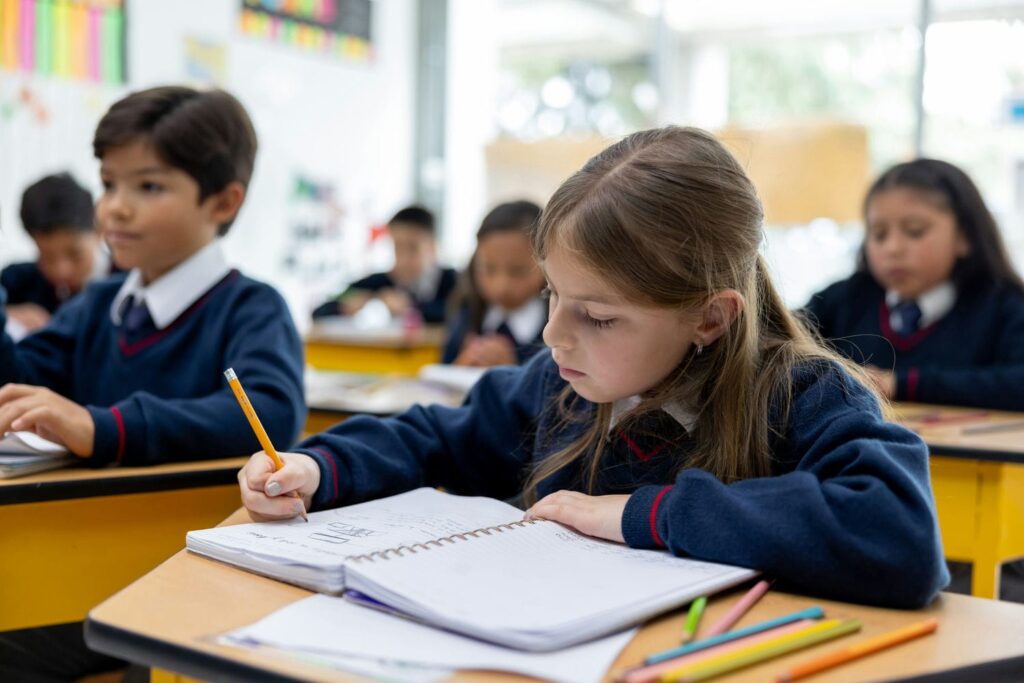 private school student taking notes in class