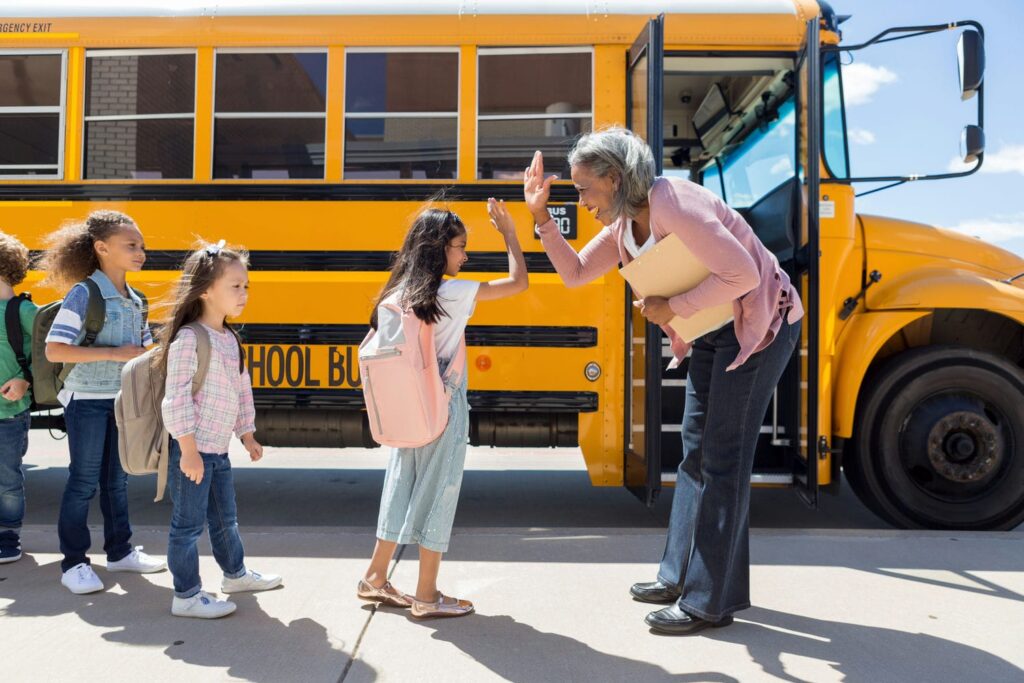 public school students boarding school bus