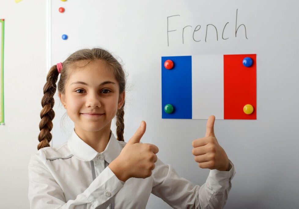 girl learning french